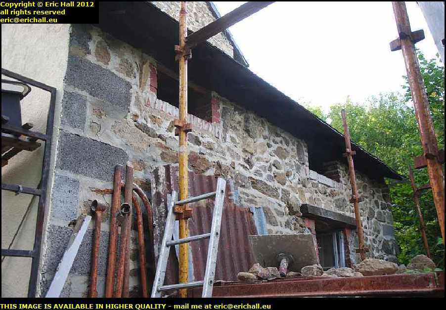 collapsed lean to repairing stone wall les guis virlet puy de dome france