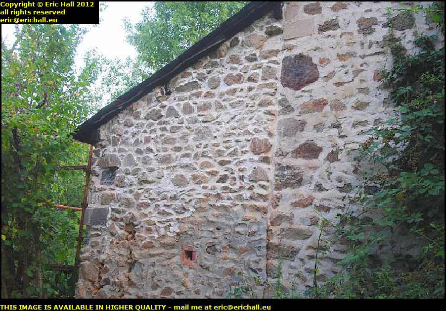 collapsed lean to stone wall repair les guis virlet puy de dome france