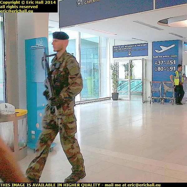 armed soldier patrol airport charles de gaulle paris france