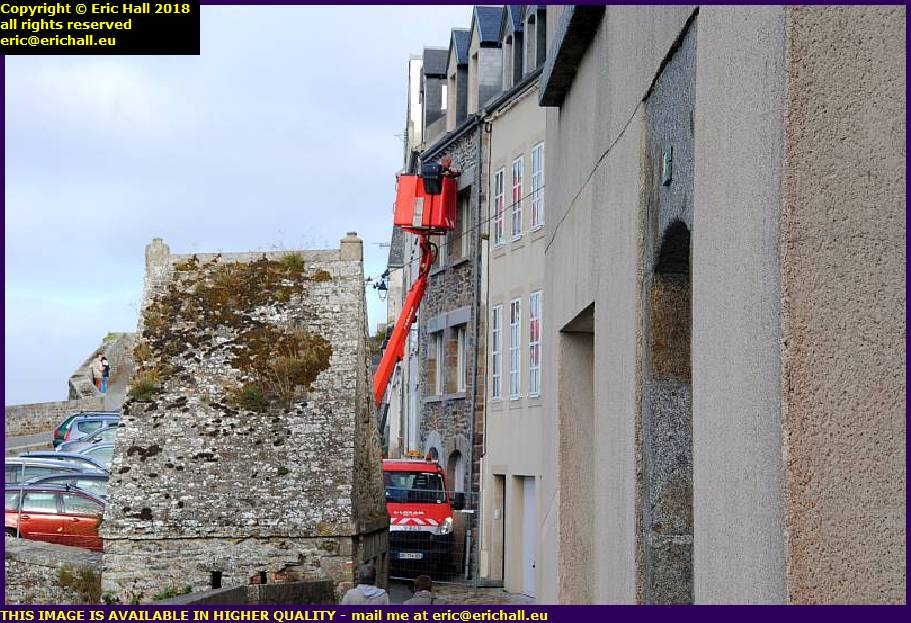 cherry picker building work rue du Nord granville manche normandy france