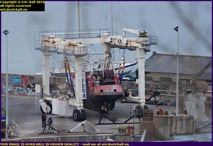 trawler lifted out of water shipyard port de granville harbour manche normandy france