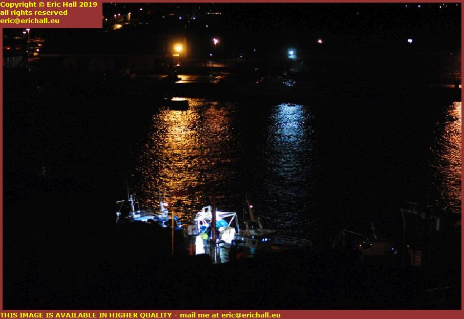night fishing boat unloading port de granville harbour granville manche normandy france
