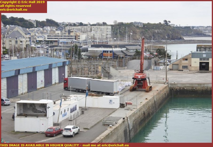 lorry unloading supplies port de granville harbour manche normandy france
