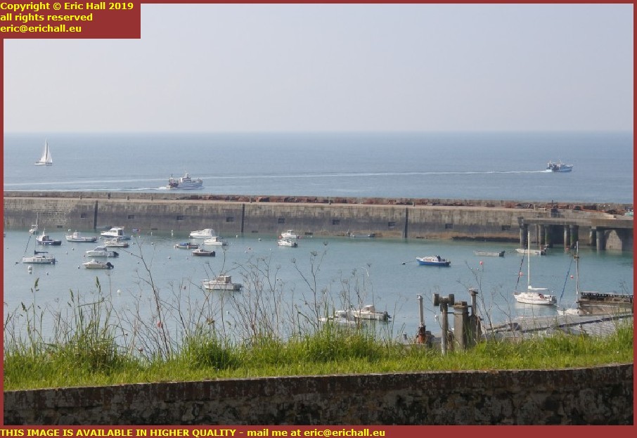 fishing boats leaving harbour granville manche normandy france
