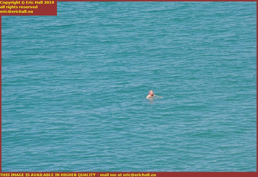 man swimming in sea plat gousset granville manche normandy france eric hall