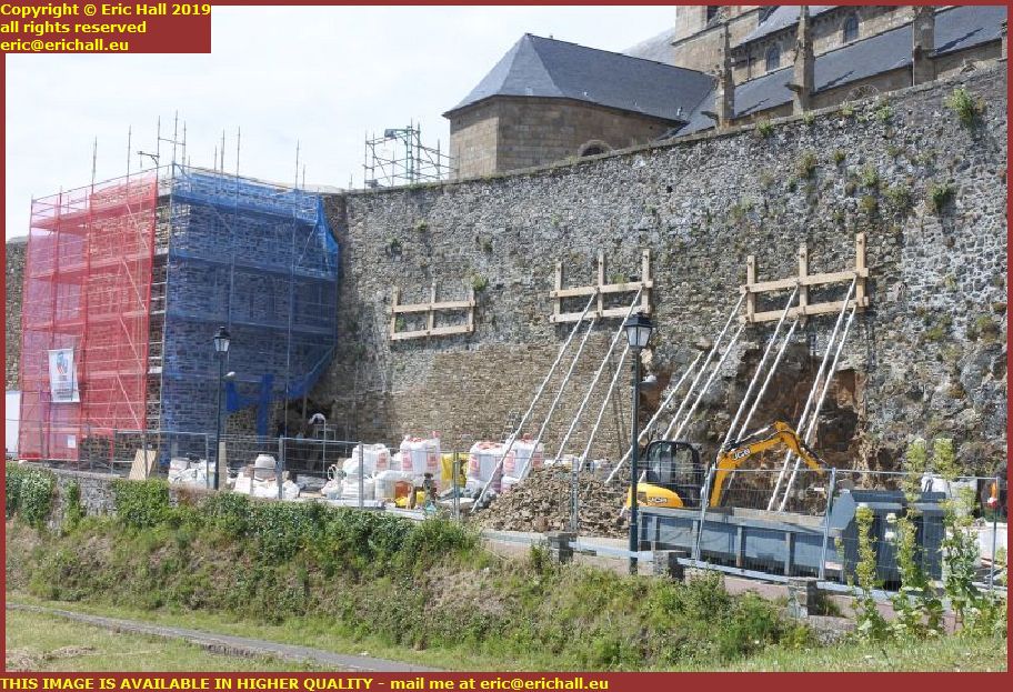repairing medieval city walls granville manche normandy france