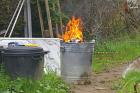fire in the galvanised dustbin avril april 2009 copyright free photo royalty free photo