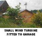 small wind turbine fitted to garage Eric Hall Les Guis energies renouvelables renewable energy