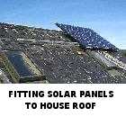 small wind turbine fitted to garage Eric Hall Les Guis energies renouvelables renewable energy