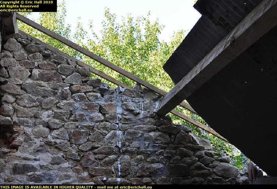 collapsed stone wall rebuilding lean to les guis virlet puy de dome france